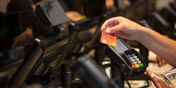 Payment card with a human hand. 