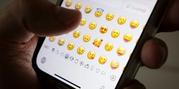 Person using emojis on the phone