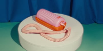Tin Can landline phone in pink and orange