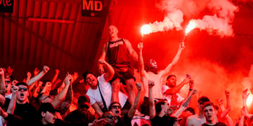 ajax football clb fans, men, red light, red steam, bald man, crowd hands up