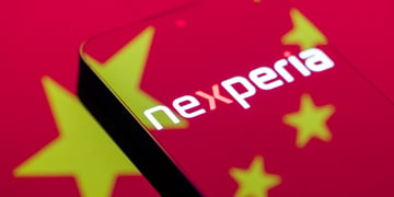 nexperia sign, orange x, china flag reflective smartphone screen