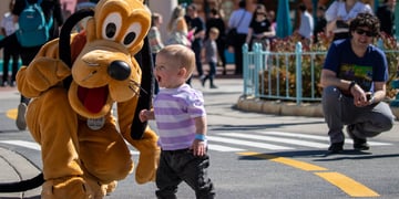 pluto dog, disneyland, sunny day, white blonde male todler 