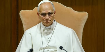 pope leo, sand color arm chair, white clothing, old man, glasses, two black microphones