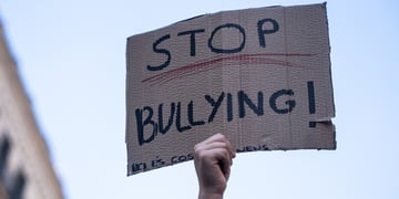 Sign that says "Stop bullying"