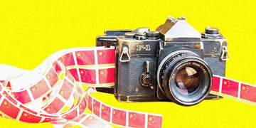 vintage looking camera spitting out tapes with china flags