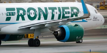A Frontier airplane on the runway