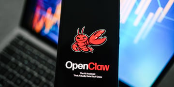 openclaw logo, red lobster, black smartphone screen, laptop keyboard