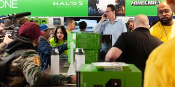 People in store buying Xbox