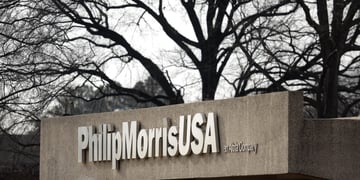 Signage is displayed outside the Phillip Morris USA Inc. production facility in Richmond
