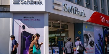 soft bank signage, white logo, white asian passers by on the street, white walls