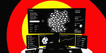 A human sitting at a desk prompting AI to spam a map of Germany with propaganda.
