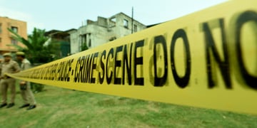 A police entry tape to a crime scene in India.