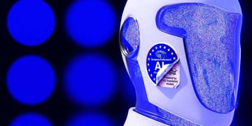 A robot's head, a sticker that says "European Parliament AI"