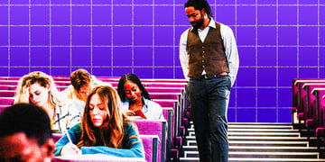 A professor walks in the classroom and observers students taking an exam