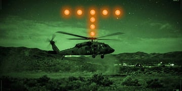 A helicopter with orange orbs flashing nearby.