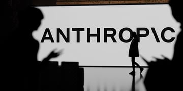 Anthropic logo on the wall screen