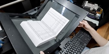 books being scanned page by page