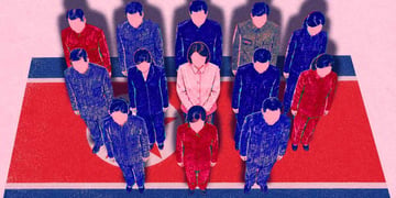A group of fake North Korean remote workers standing on a North Korean flag