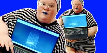 A human content creator with her "AI child" on her laptop.