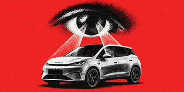 A BYD electric car under a watchful surveillance eye.