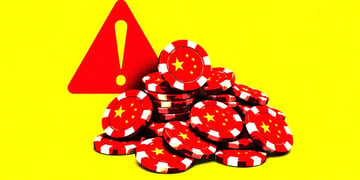 Casino chips and a red exclamation sign.