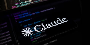Claude logo in the black background with snippets of source code in the background