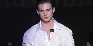 Looksmaxxer Clavicular on a dark runway.