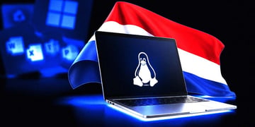 A laptop screen with the Linux logo on it, the flag of the Netherlands