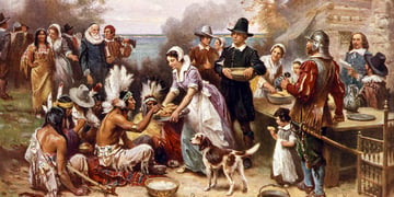 first thanksgiving 1621. Pilgrims and Natives gather to share meal