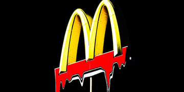 Melting McDonalds logo with a black background