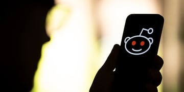 The Reddit logo is seen in this photo illustration