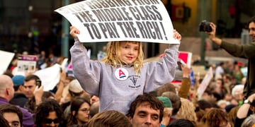 A young girl protesting for a better future in Foley Square, 2012.