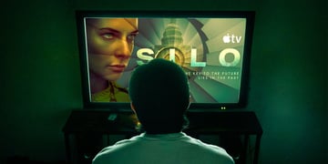 person watching silo on tv
