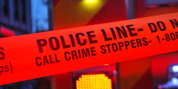 Crime Stoppers written on red police tape