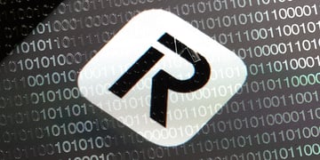 Revolut logo in the grey background with binary code