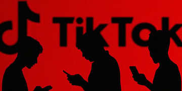 People in red background with TikTok logo