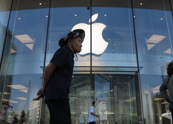 apple store, glass wall, apple logo, old asian man, hands behind back, cowboy hat camouflage print, 