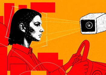 Driver in a car with camera