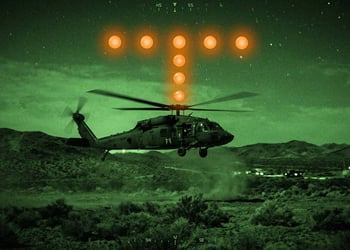 A helicopter with orange orbs flashing nearby.
