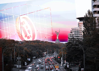 Crypto symbols and the panorama of Kyiv in the background