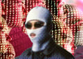 A masked hacker against human AI agents.
