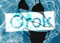 Grok logo and a bikini