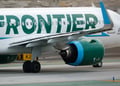 A Frontier airplane on the runway
