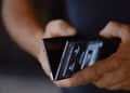 Samsung Unpacked man holding foldable phone