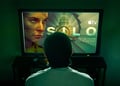 person watching silo on tv